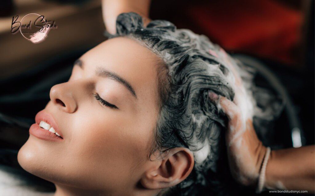 Woman having her hair washed at Bond Studio NYC
